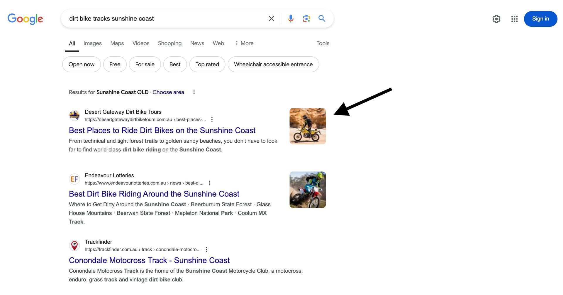 A person is riding a bike on a google search page.