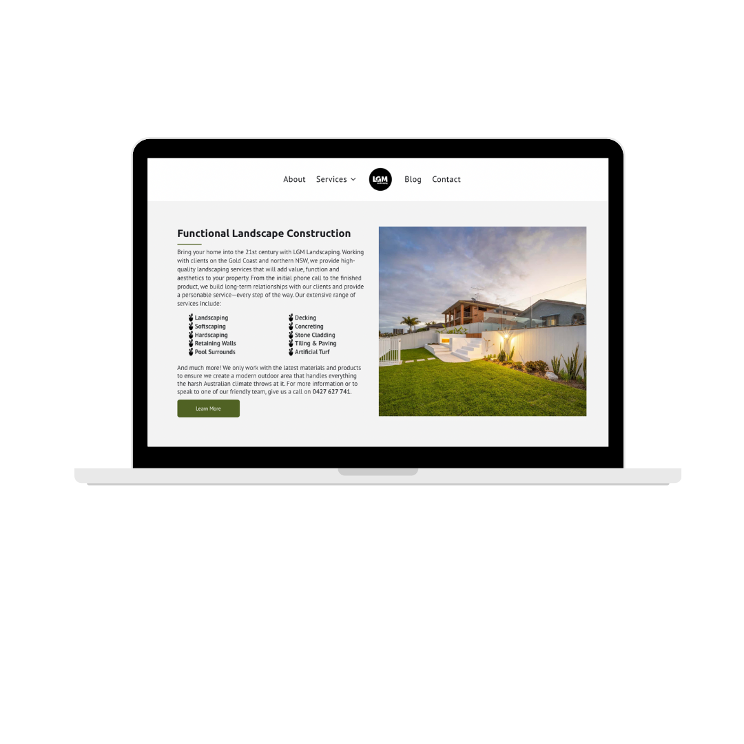 A laptop computer with a picture of a house on the screen.