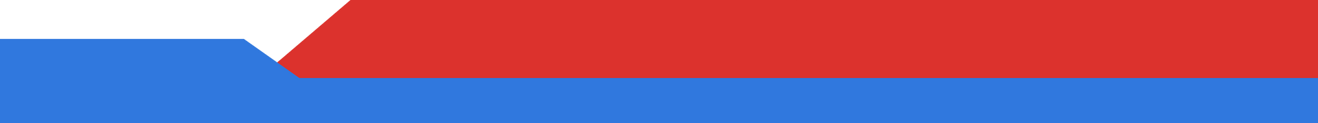 A red , white and blue object is floating in the air.