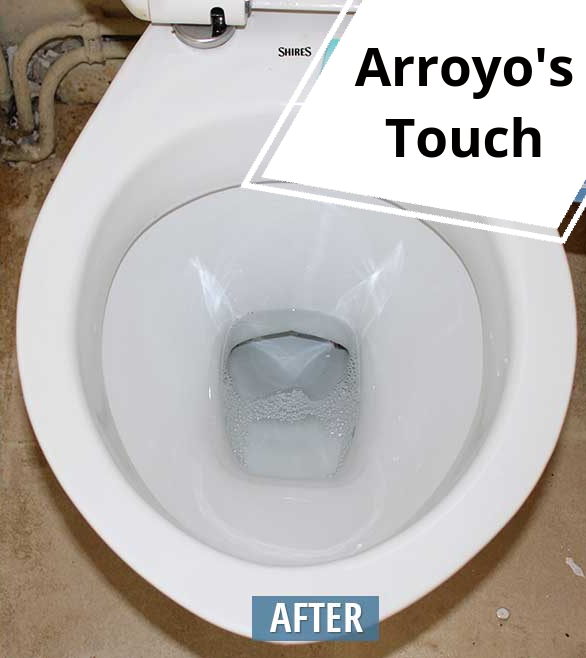 Clean white toilet bowl, view from above.