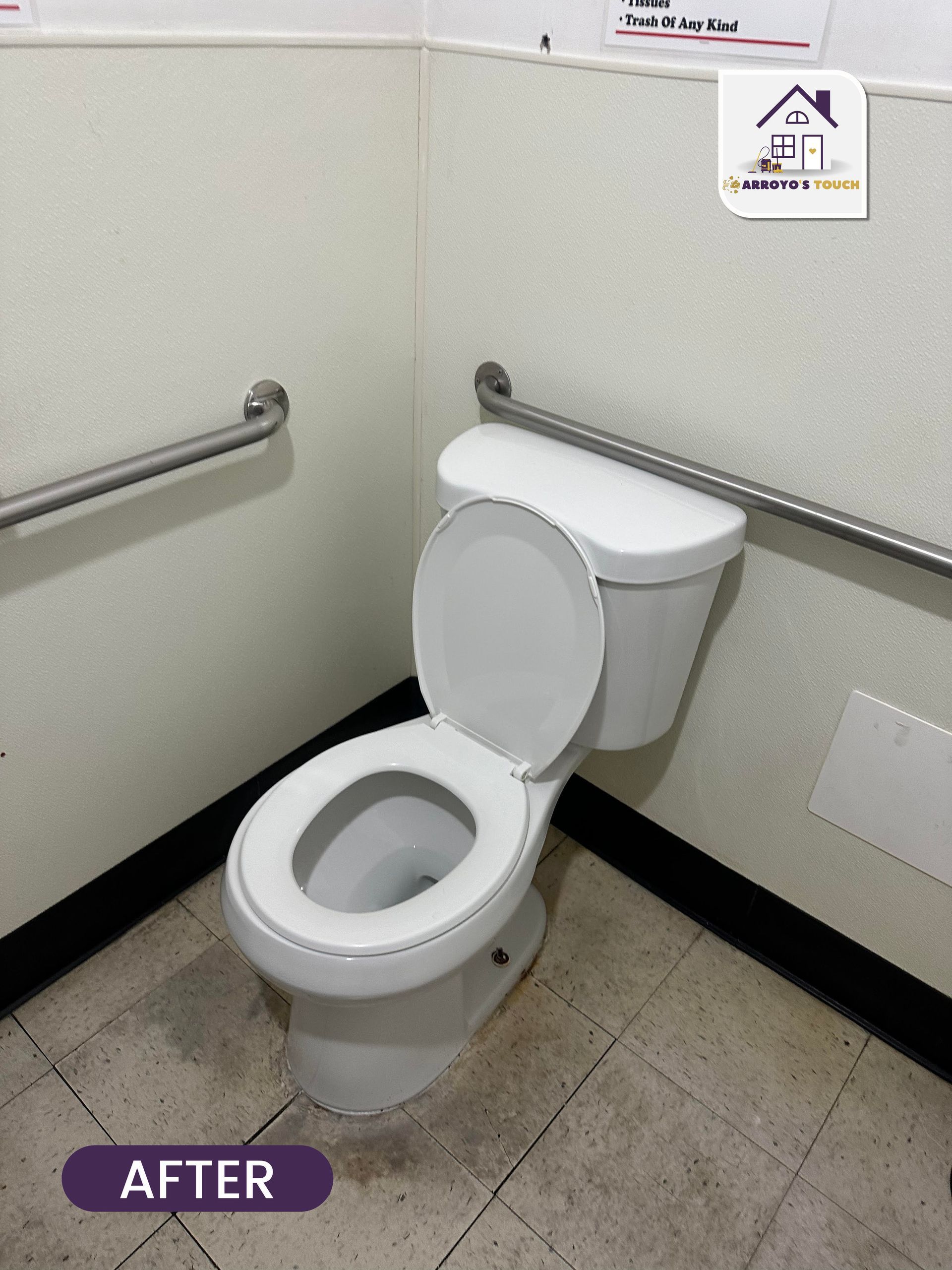 White toilet with open seat and grab bars in a corner bathroom, labeled