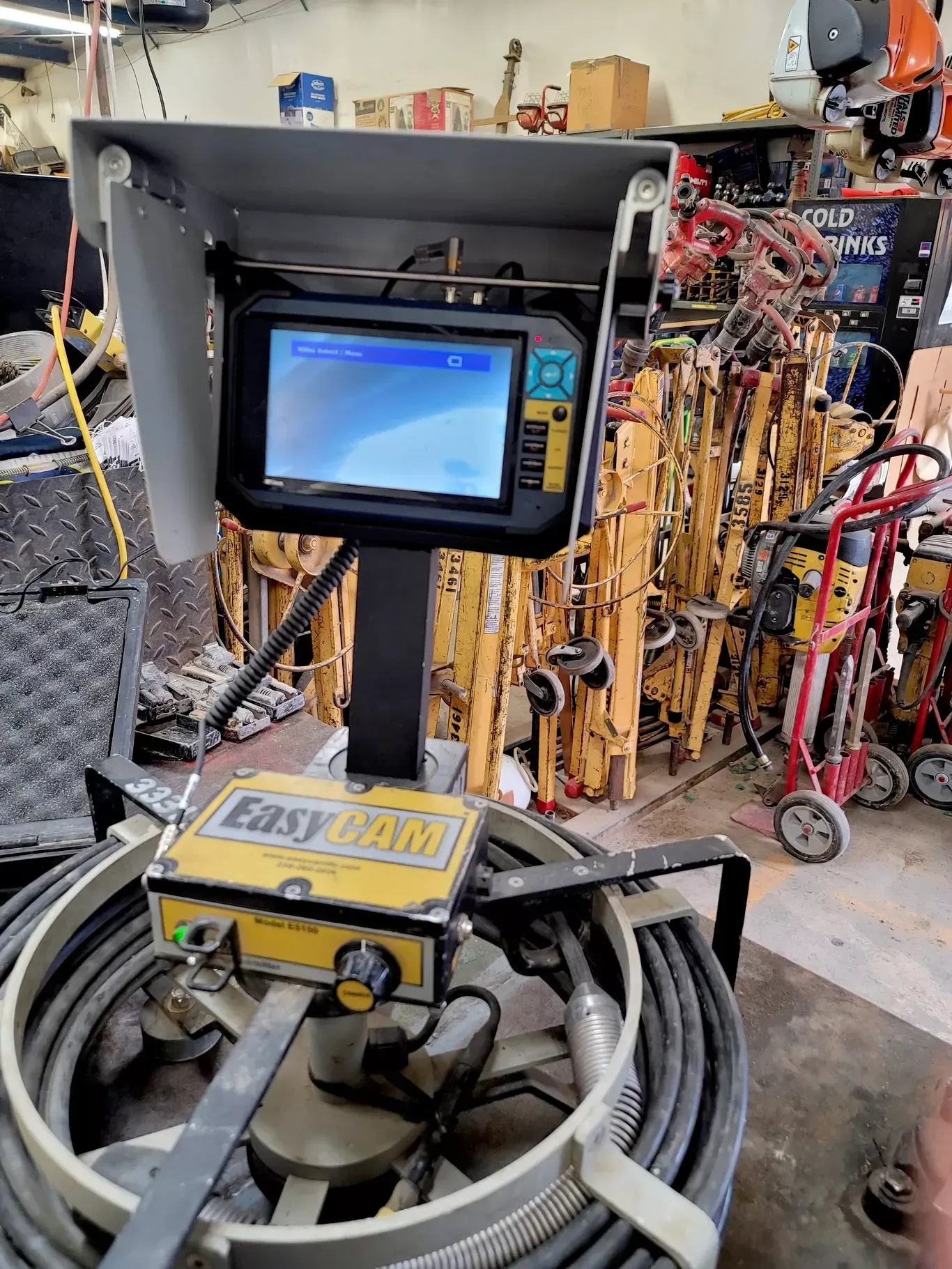 A yellow and black device with the word easy on it