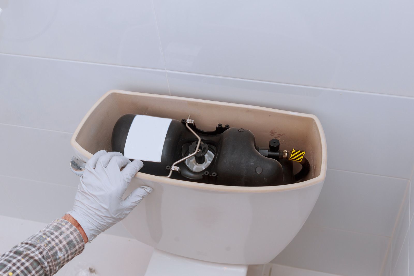 A laundry room with a washer and dryer and a sink