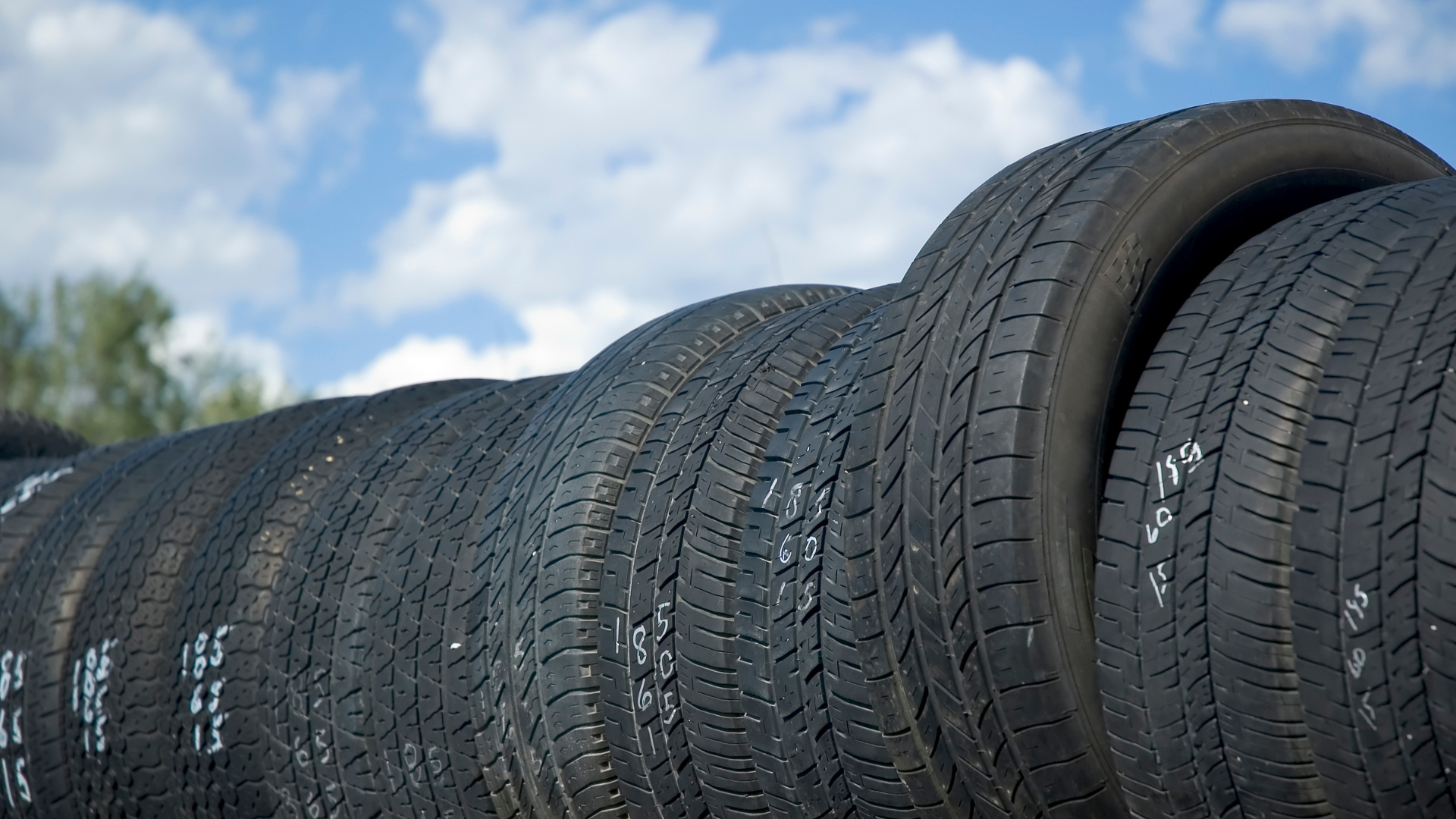 A bunch of tires are stacked on top of each other