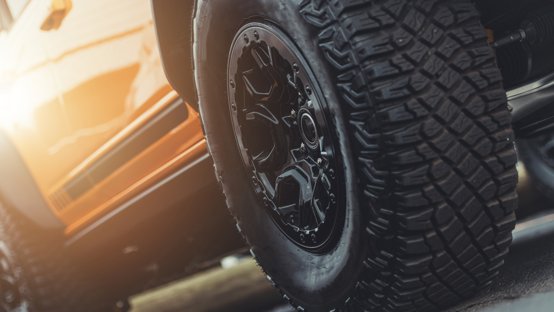 A pile of old tires are stacked on top of each other.