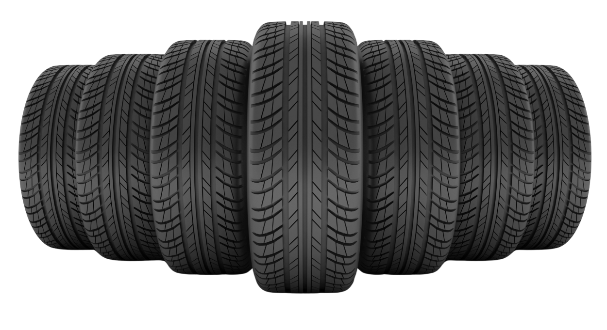 Four tires are stacked on top of each other on a white background.