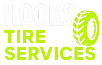 A green and white logo for Hooks Tire Services