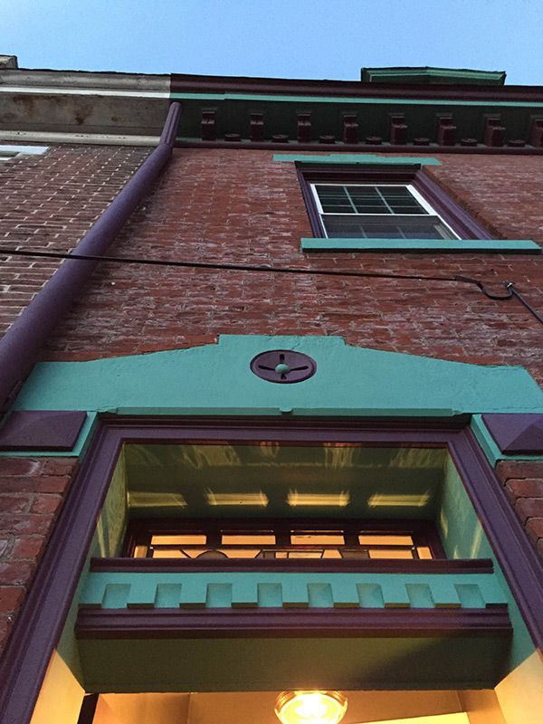 cement on the outside of a brick building painted to change  highlight color