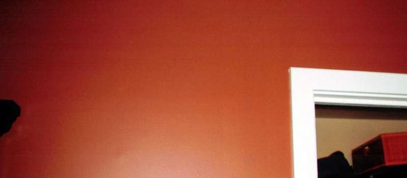 orange painted walls with white trim