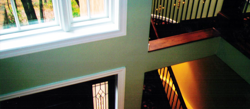 green painted walls with white trim