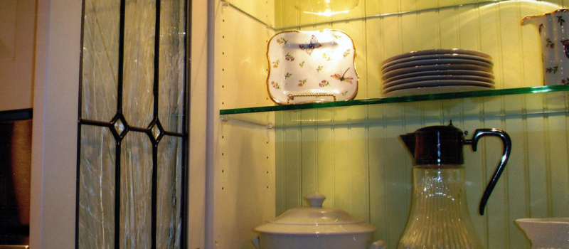 inside of a china cabinet that was painted by ESP PAINTING