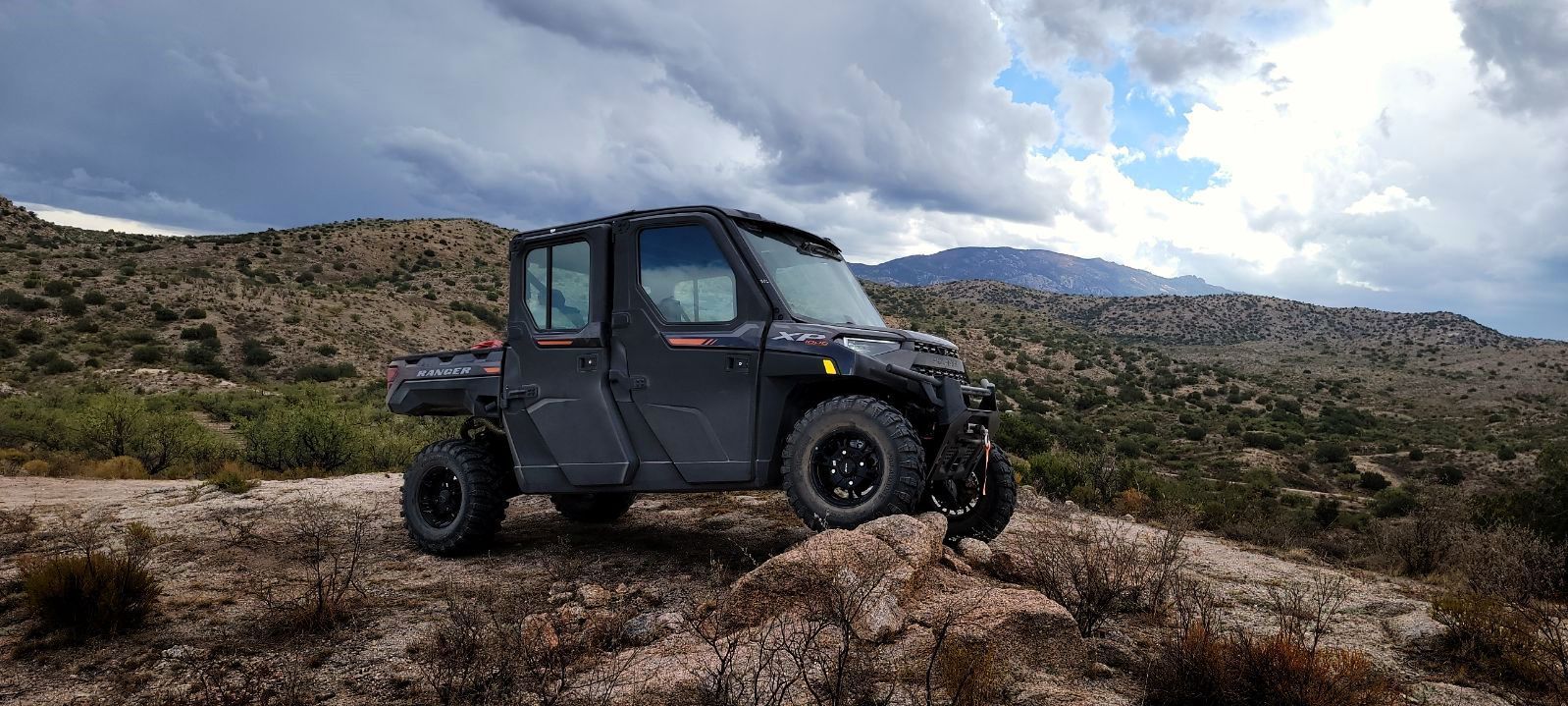 Person driving Polaris RZR 4 1000 in Tucson AZ