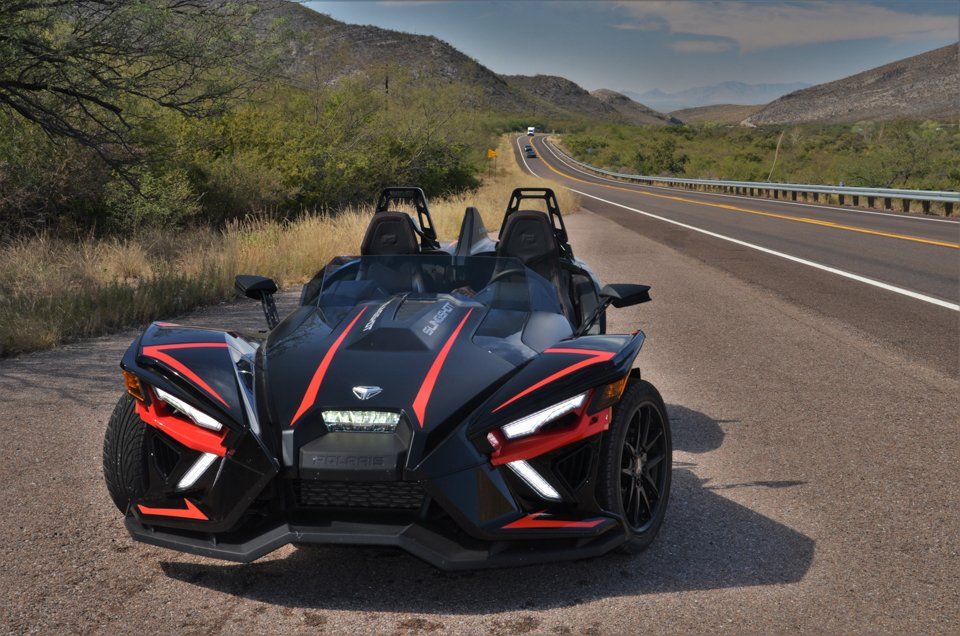 Black Polaris Slingshot Parked on side of Highway in Tucson AZ