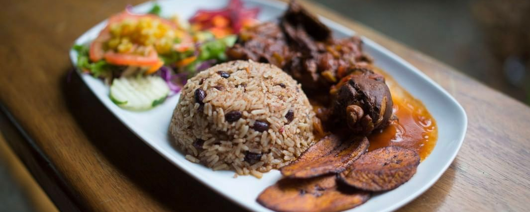 Traditional Caribbean plate at Selvin’s Restaurant in Punta Uva, Costa Rica — rice and beans with chicken, plantains, and salad.