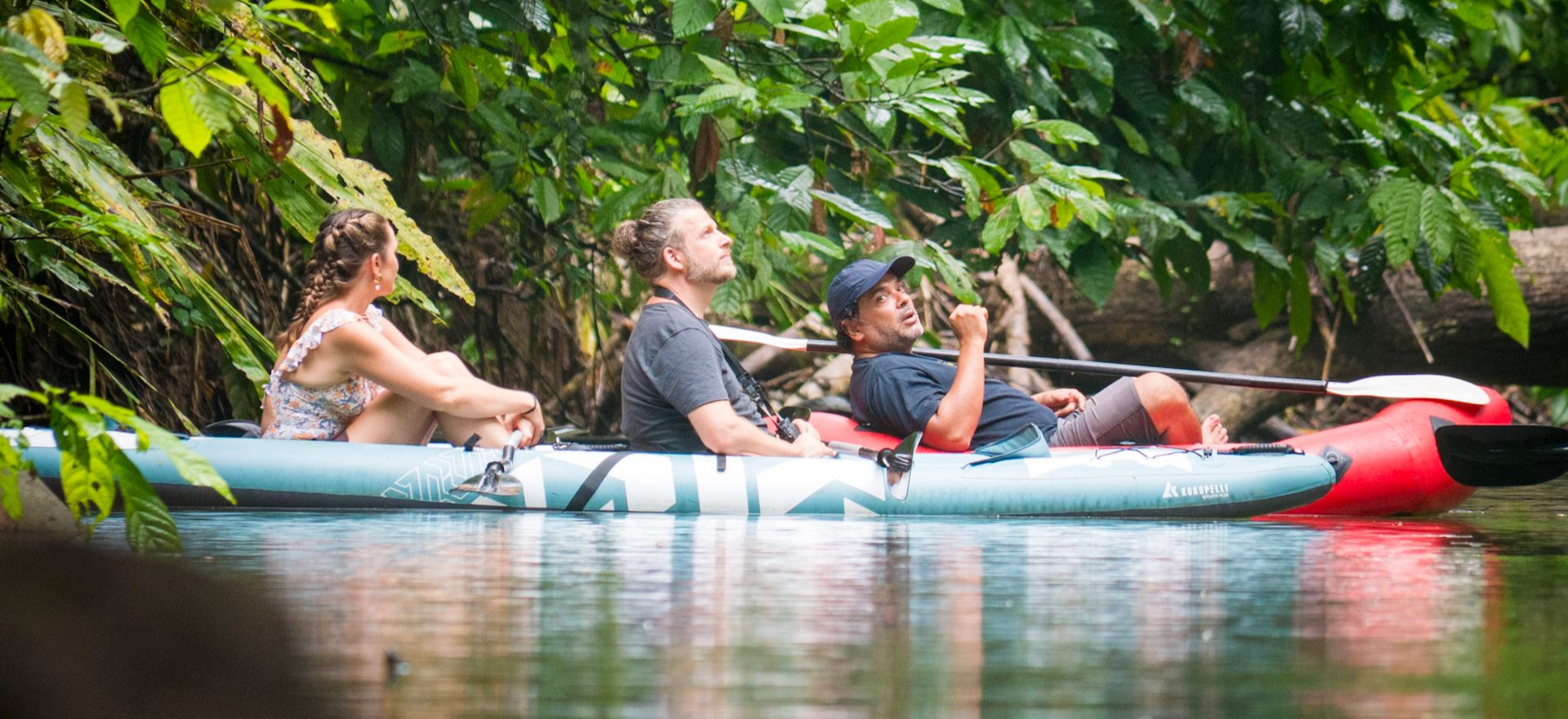 Guests kayaking with a local guide through the calm estuary of Punta Uva during the Sloth & Kayak Tour by Caribe Sur Tours.