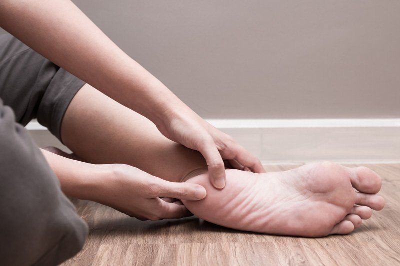 Massaging Foot — Mansfield, OH — Schwein Foot & Ankle Clinic