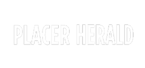 The word placer herald is written in white letters on a white background.