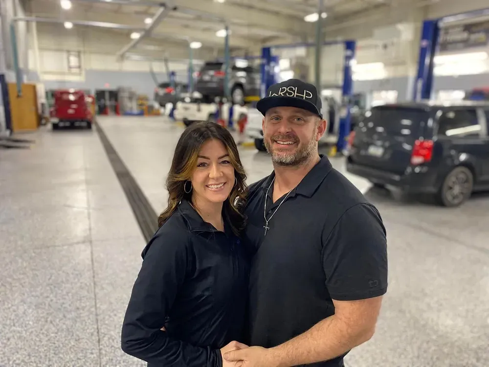 Owner and Wife inside of garage | Fast Lane Auto Repair