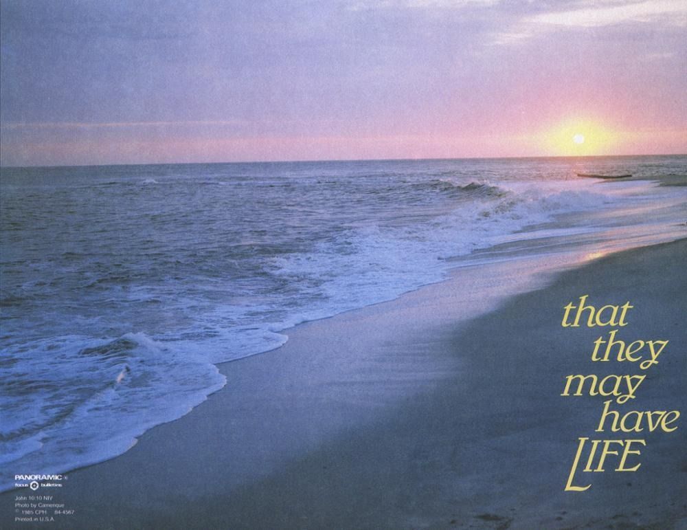 Beach at sunset, waves rolling in, sand. Text: 