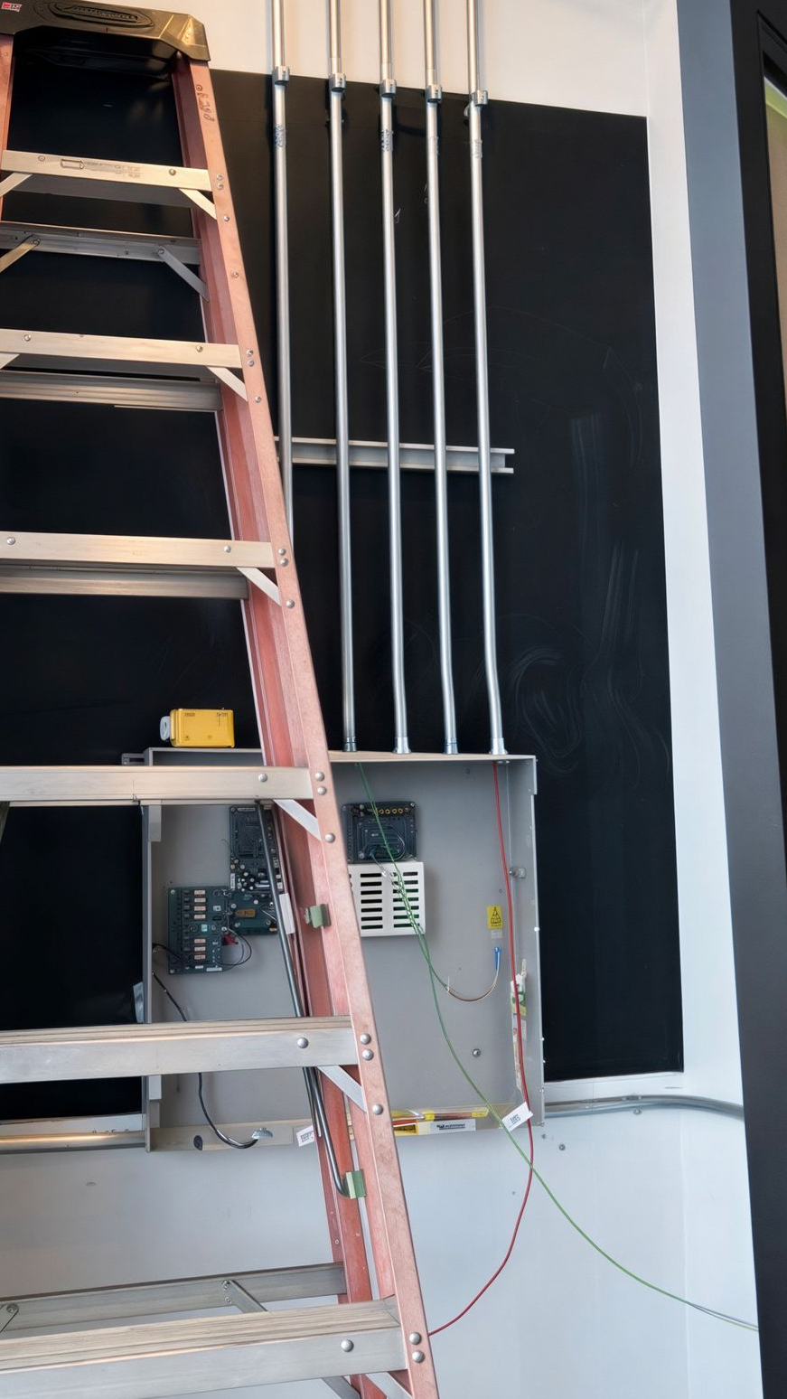 Commercial fire alarm installation by electrician in Edmonton building