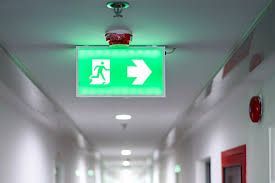 Emergency exit lighting installation in Edmonton commercial building