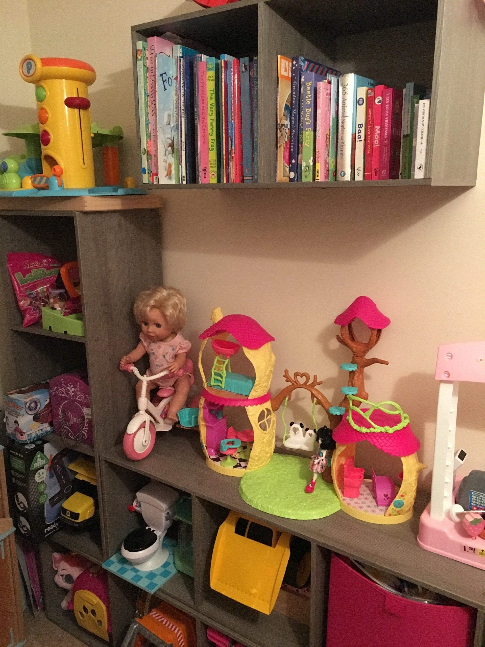Books and toys organised in a child's bedroom