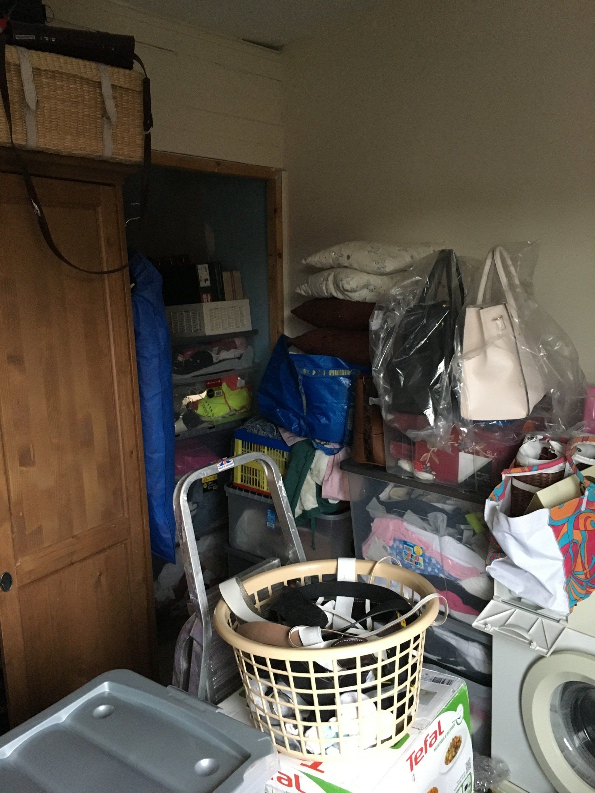 Spare bedroom with bags full of stuff