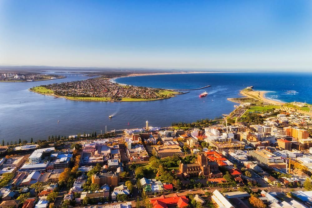 An Aerial View Of A City Next To A Body Of Water — SG Mobile Mechanic In Newcastle, NSW