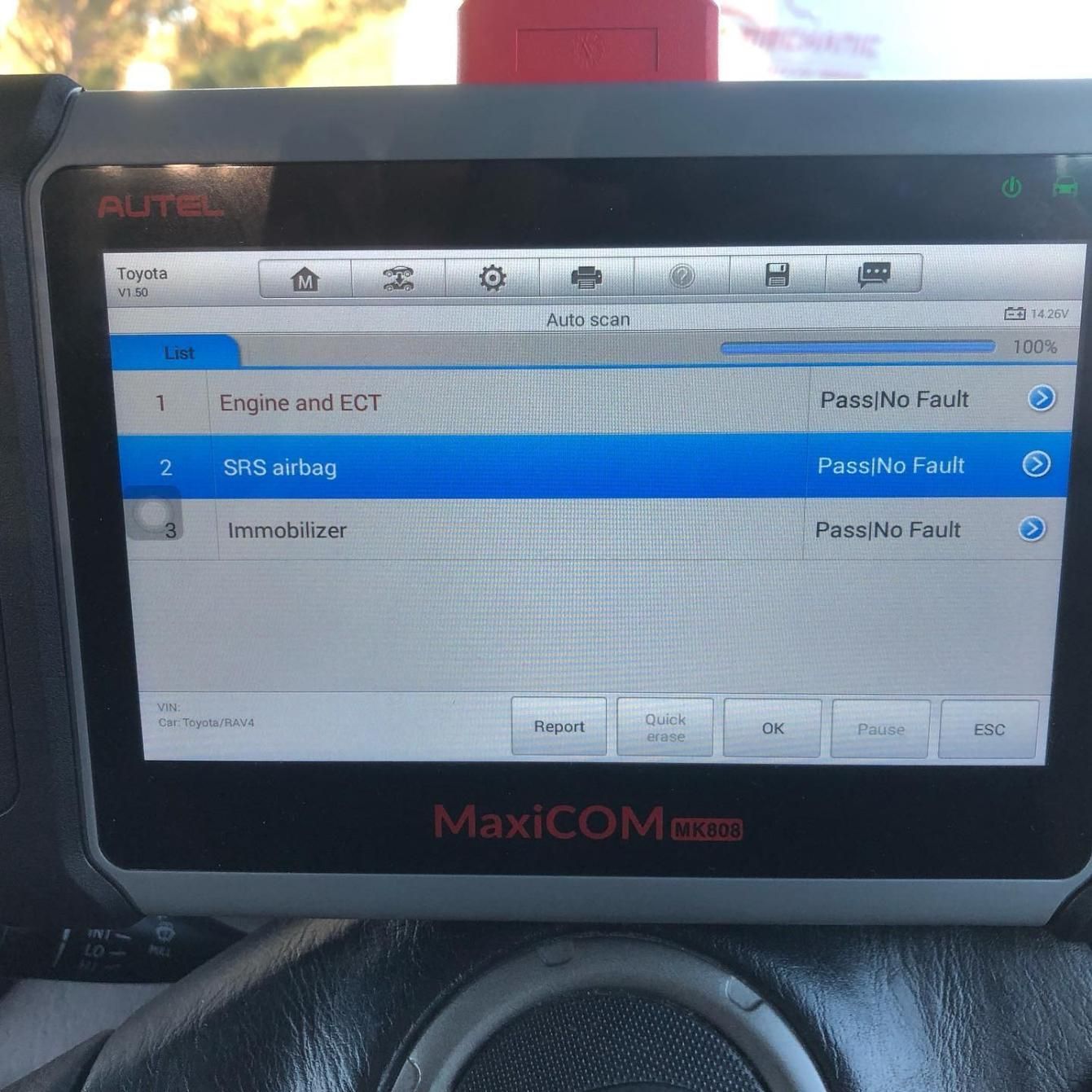 A Maxicom Device Is Sitting On The Dashboard Of A Car — SG Mobile Mechanic In Lake Macquarie, NSW