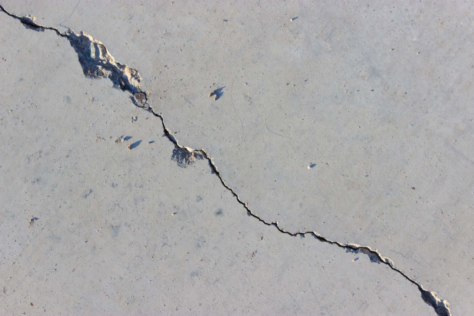 Large crack to be repaired in concrete wall