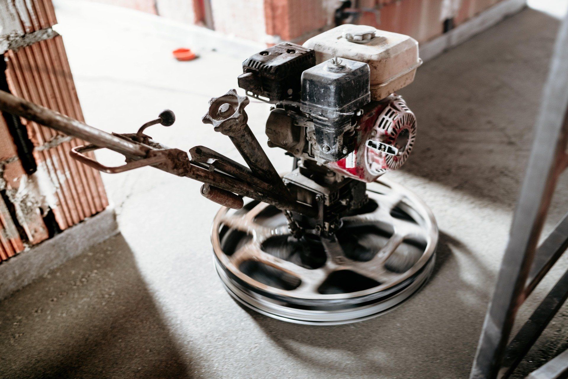Power trowel finishing a concrete floor in Rancho Cucamonga