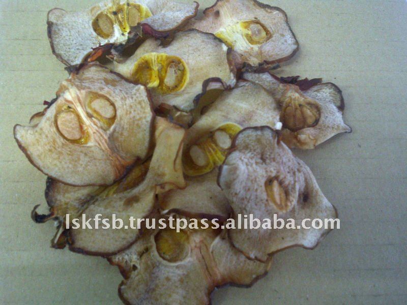 Dried apple slices, tan with brown edges, showing seed pockets.