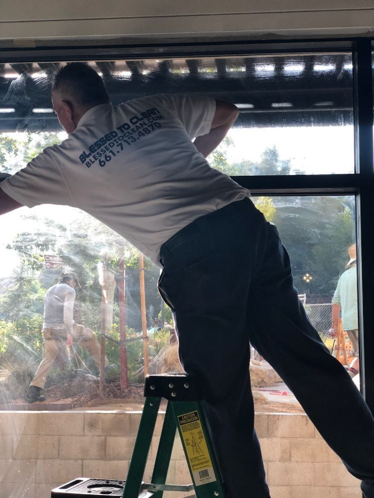 Stain — Man Cleaning Window in Santa Clarita, CA