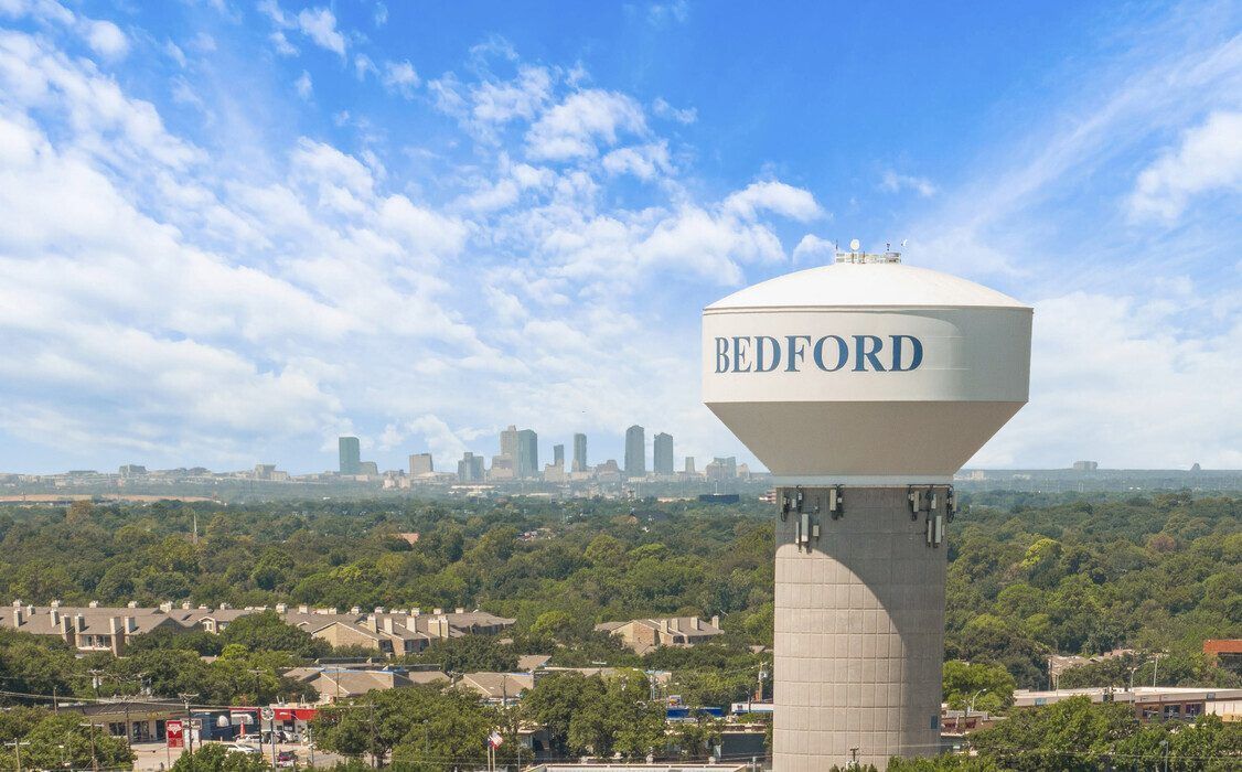 An aerial view of a water tower in bedford , texas.