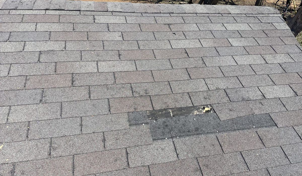 A close up of a roof with a hole in it.