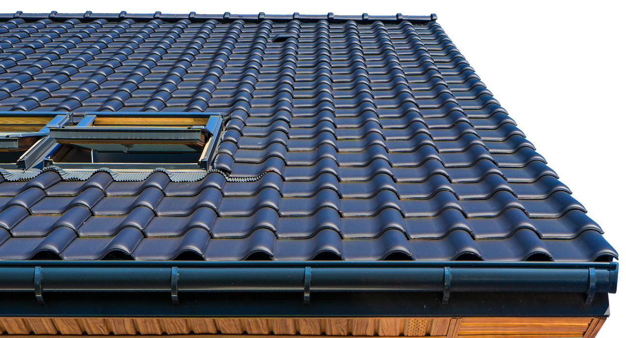 A close up of a roof with a window and gutter on a white background.