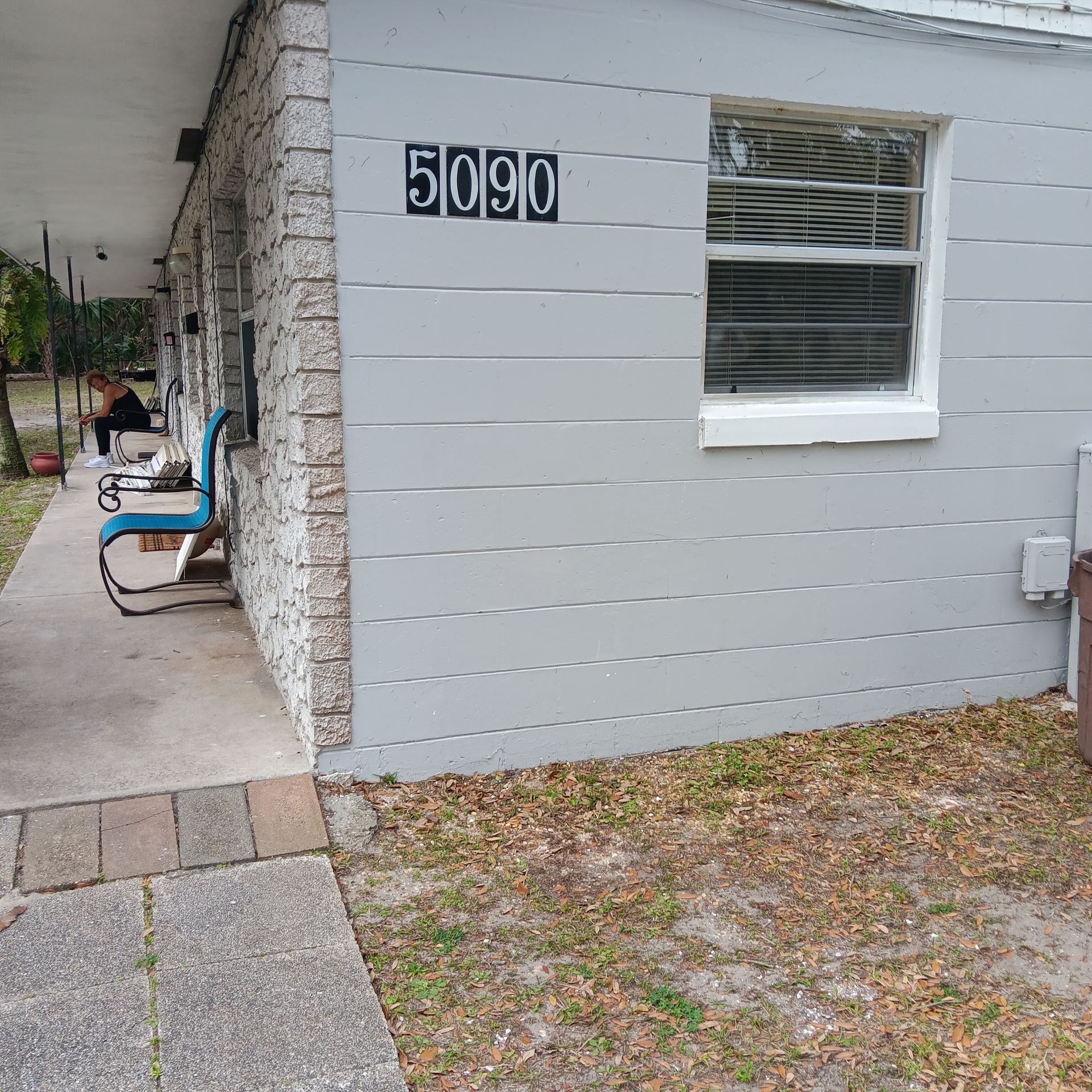 Exterior view of a building with address 