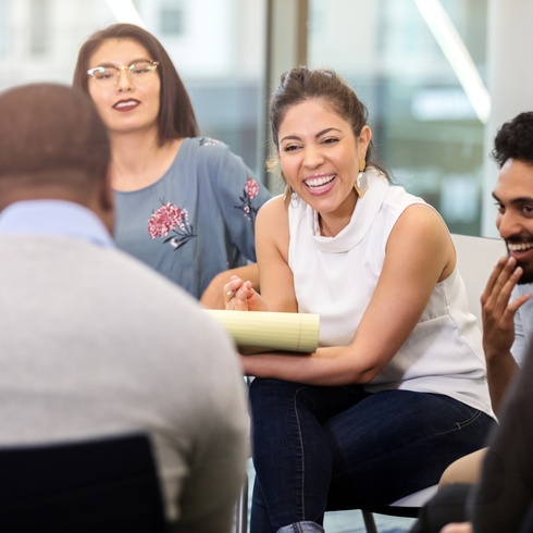 Female counsellor talking to a young girl