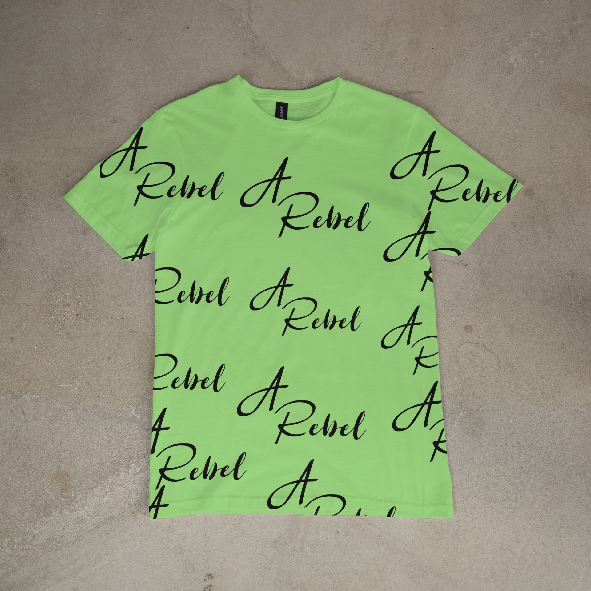 green t-shirt with black cursive with A Rebel all over front and back