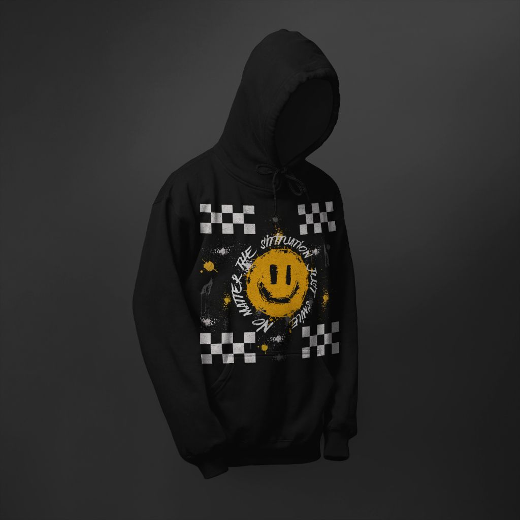 A black hoodie with a smiley face on it