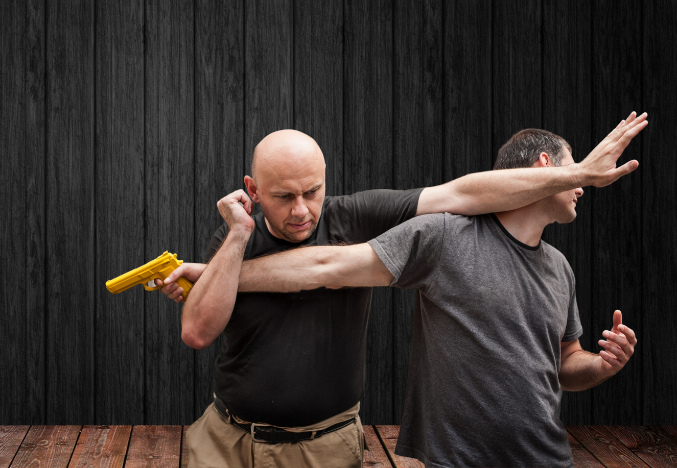 A man Block Pistol from another man