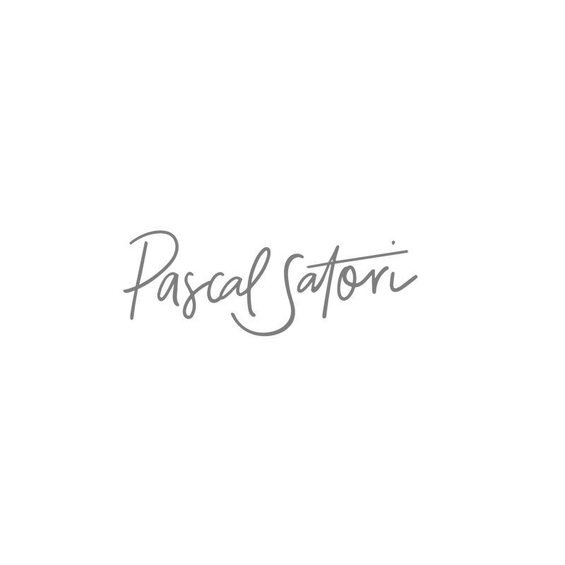 The logo for pascal satori is written in cursive on a white background.