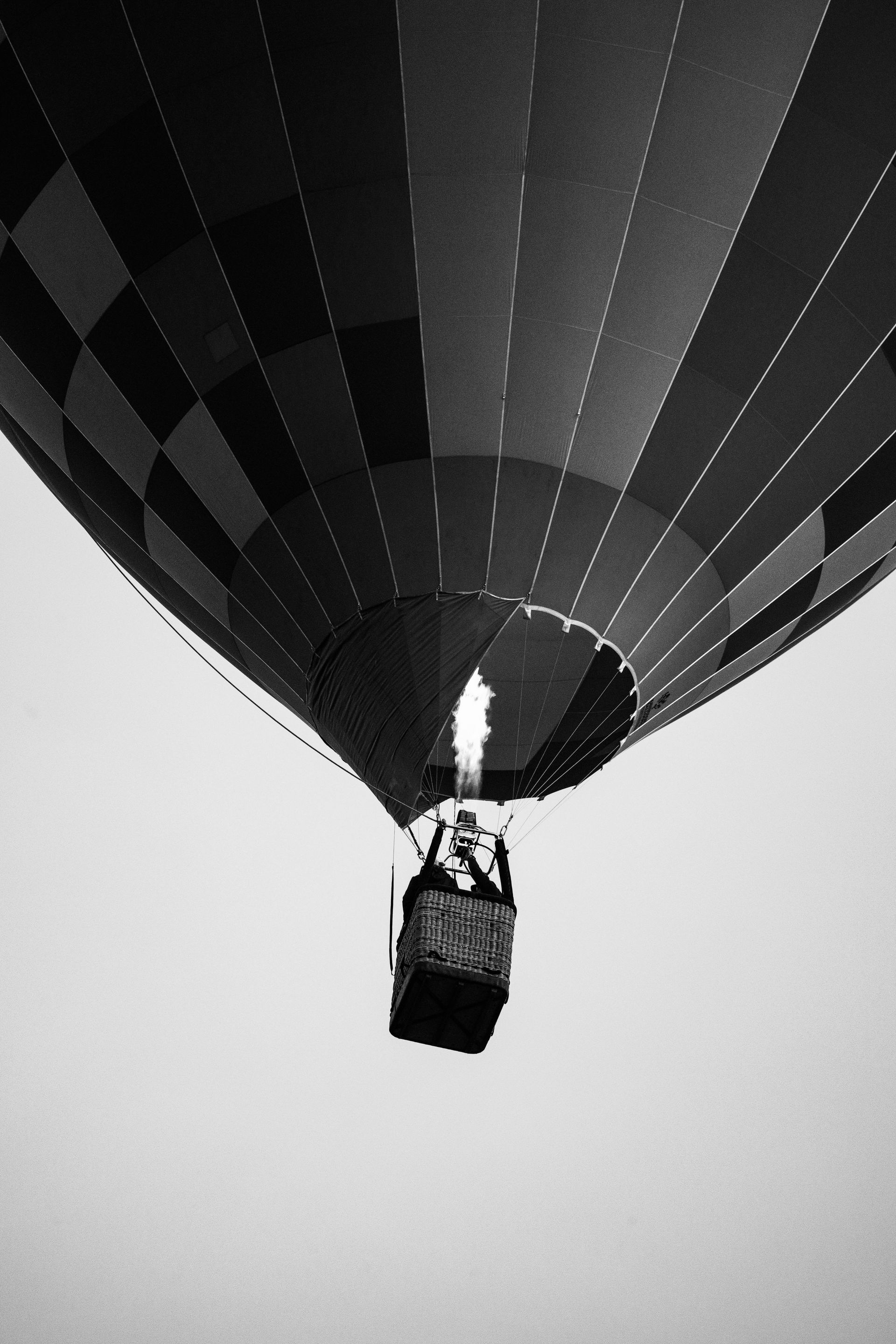 A black and white photo of a hot air balloon