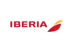 O logotipo da companhia aérea Iberia apresenta texto vermelho com um desenho estilizado de uma asa vermelha e amarela à direita, sobre um fundo branco.