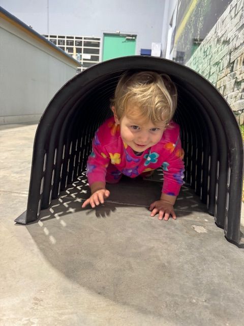Child Crawling Out Of Plastic Tunnel — Bennett's Environmental In South Nowra, NSW
