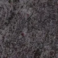 A close up of a gray granite counter top.