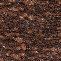 A close up of a brown granite counter top.