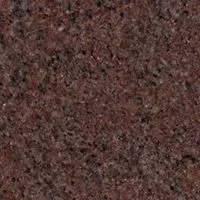 A close up of a brown granite counter top.