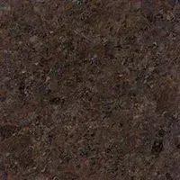 A close up of a brown granite counter top.