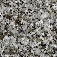 A close up of a granite counter top with a camouflage pattern.